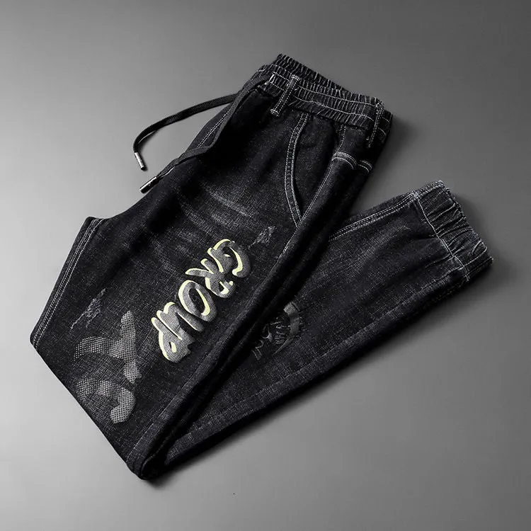 Bats Embroidery and Letter Printing Decorated Jeans