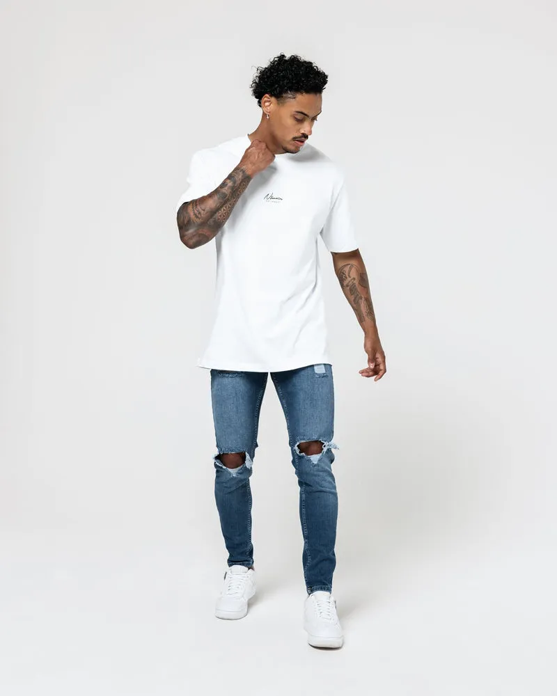 Blown Knee Skinny Jeans - Blue Wash